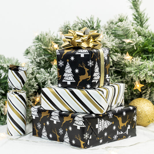 Black Reindeer Wrapping Paper Roll with Brown & Light Blue Diagonal Stripes on Reverse Wholesale Wrapholic