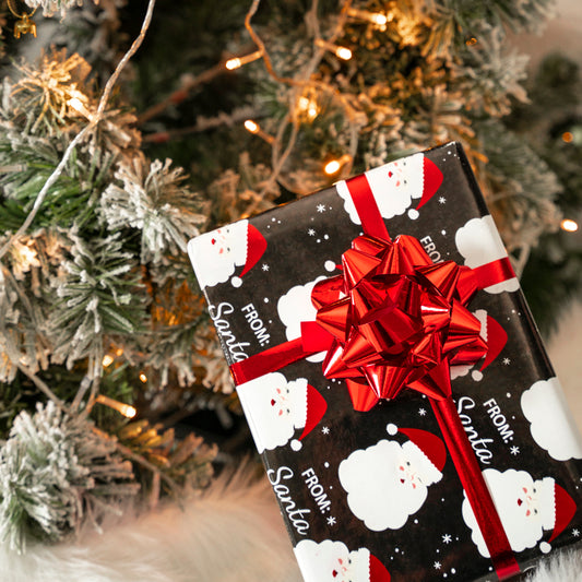 Black Winking Santa Foil Wrapping Paper Roll Wholesale Wrapholic