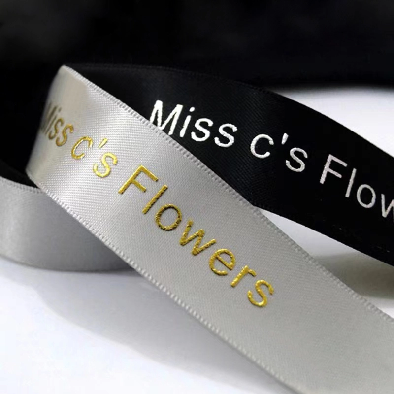 Add an extra special touch with our gorgeous personalized satin ribbon. Our ribbon is quality satin ribbon permanently and professionally printed with your own details as shown.