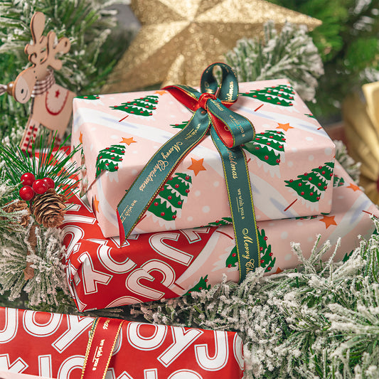 Snow Covered Tree Christmas Wrapping Paper Roll with White Joy Text on Reverse